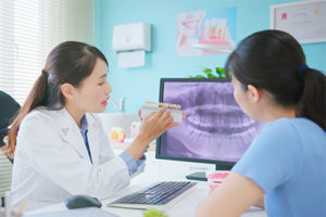 patient-consulting-with-dentist